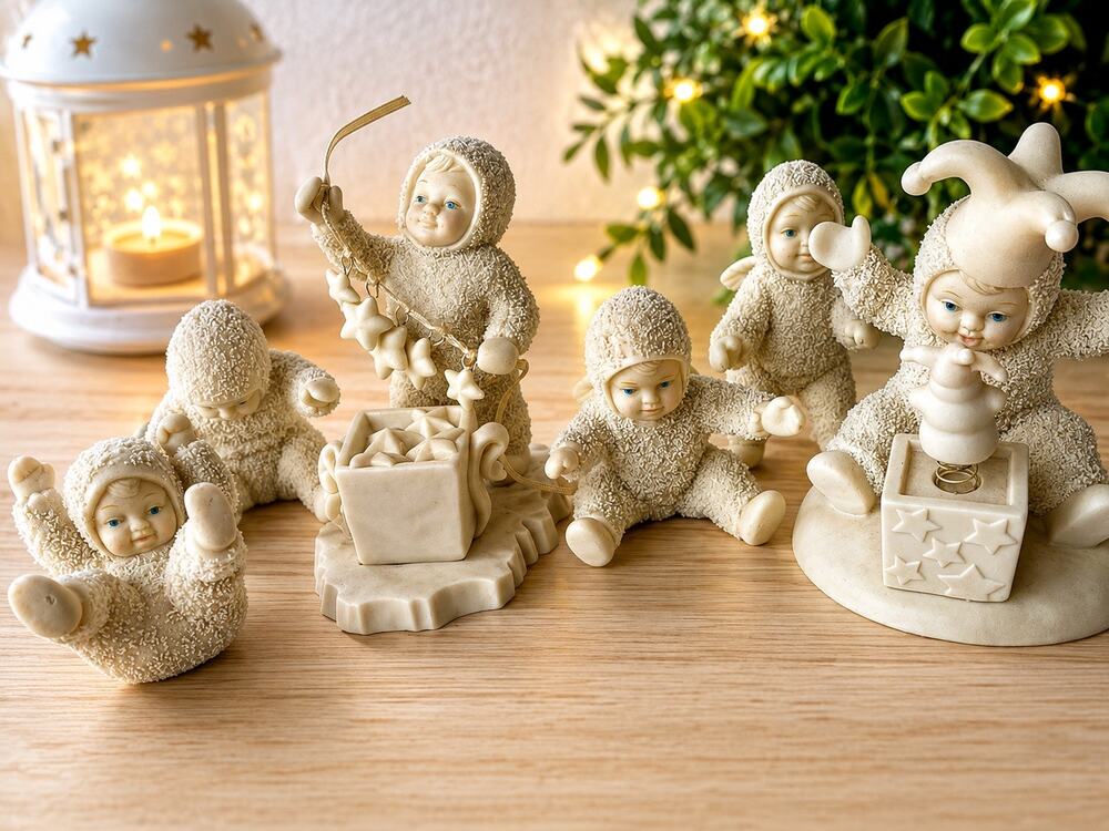 Lot of 6 vintage Department 56 Snowbabies porcelain figurines featuring